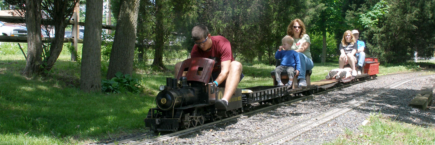 steam train with passengers along Perkiomen Trail