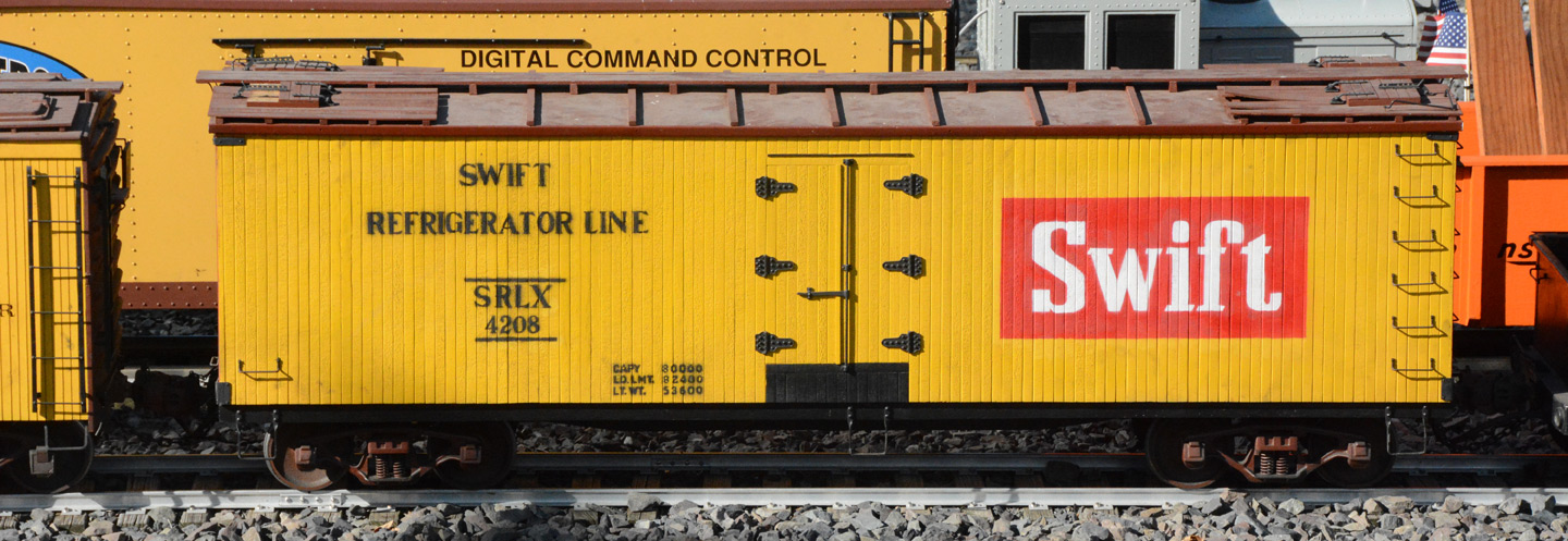 a model refrigerator car with Swift Refrigerator Line branding